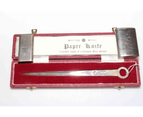 Cased silver 'meat skewer' paper knife, silver 'Howitt' lighter 1946, and white metal vesta case with Darlington inscription 