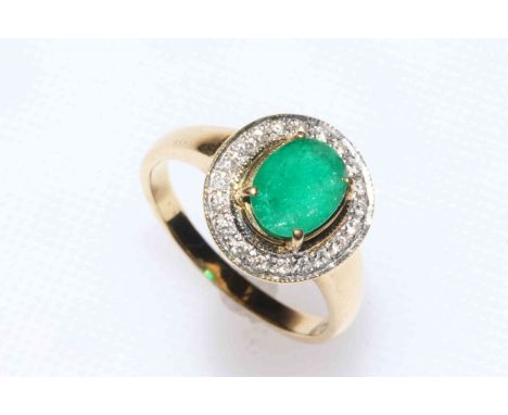 18 carat yellow gold, emerald and diamond ring having 1.37 carat emerald (size on shank) bordered with brilliants, size R.