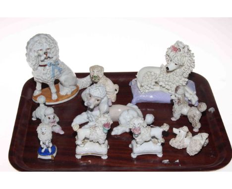 Collection of pottery poodles, Sitzendorf, Lladro, etc.