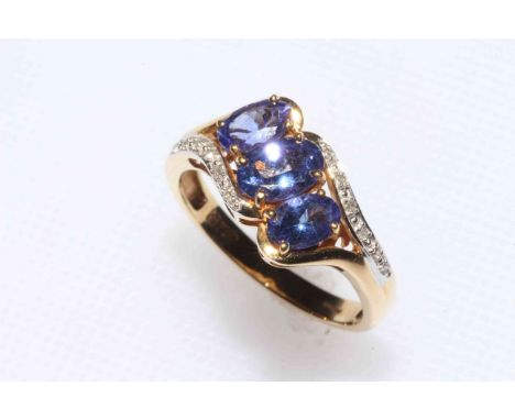 18 carat gold Tanzanite and diamond ring, total tanzanite 1.79 carat, size P, with certificate.