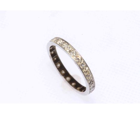 Diamond set platinum/white gold eternity ring, size M.