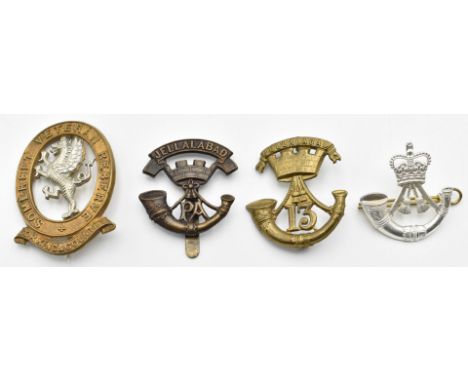 Four British Army metal badges comprising Somerset Veteran Regiment, The Rifles and two for the Somerset Light Infantry, two 