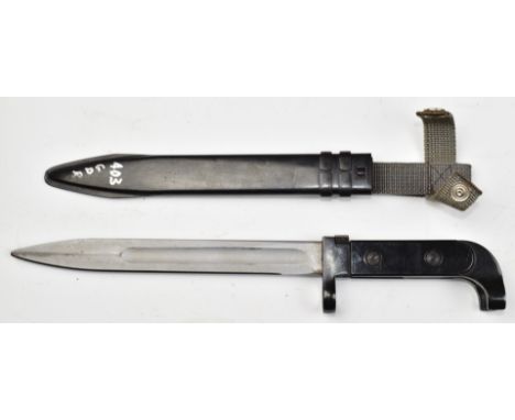 East German MPI K rifle bayonet with 20cm fullered blade, scabbard and frog.&nbsp;PLEASE NOTE ALL BLADED ITEMS ARE SUBJECT TO