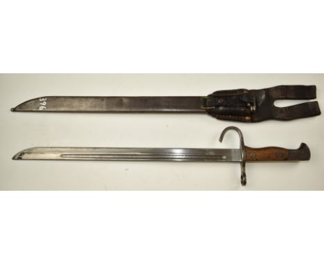 Japanese Arisaka type 30 bayonet with 38cm fullered blade, scabbard and frog.&nbsp;PLEASE NOTE ALL BLADED ITEMS ARE SUBJECT T