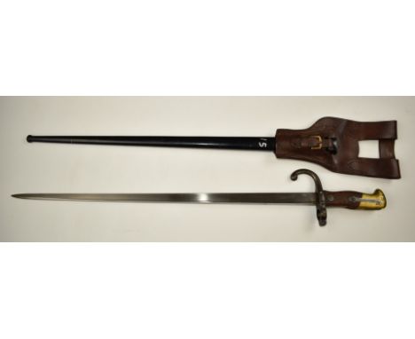 French 1874 pattern Gras bayonet stamped 64571 to quillon, manufacture date 1875 to top of 52cm T form blade, with scabbard a