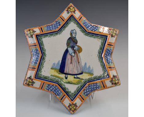 Henri Quimper star plaque, diameter 24cm
