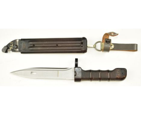 Russian AK74 bayonet ink stamped M to ricasso, with 16.5cm serrated blade, scabbard and frog. PLEASE NOTE ALL BLADED ITEMS AR