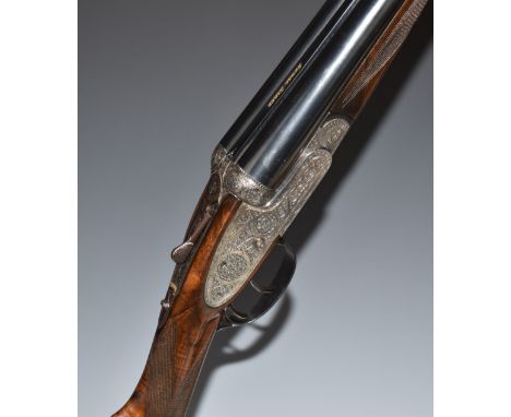 Sabel Regal 12 bore side by side ejector shotgun with floral and scrolling engraving to the hand-detachable locks, trigger gu