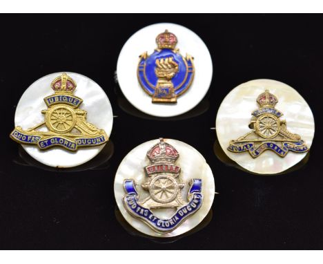 Three mother of pearl, metal and enamel sweetheart brooches for the Artillery and one for the Royal Armoured Corps