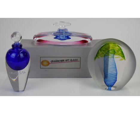 Three pieces of studio glass comprising Graham Muir Hot Glass scent bottle in original box, a further indistinctly signed sce