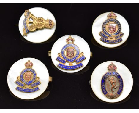 Five mother of pearl, metal and enamel sweetheart brooches comprising three for the Royal Ordnance Corps, one Royal Corps of 