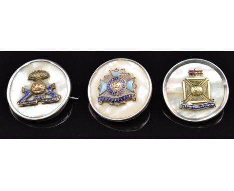 Three mother of pearl, enamel and silver rim sweetheart brooches for the Lancashire Fusiliers, Bedfordshire Regiment and Wilt