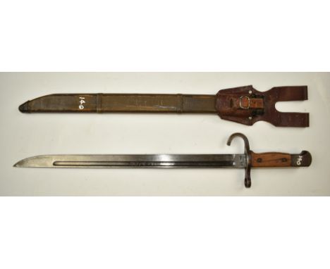 Japanese Arisaka type 30 bayonet stamped 779866 to pommel and with good stamps to ricasso, with 40cm fullered blade, wooden s