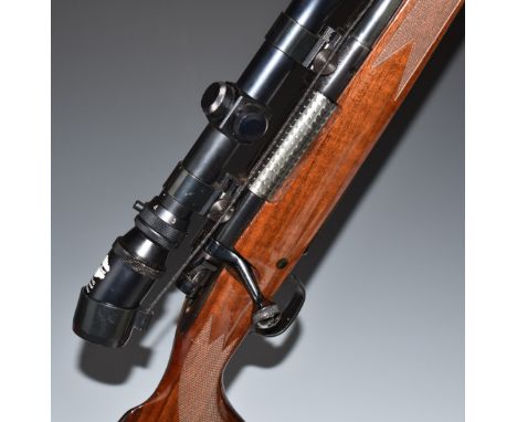 Winchester model 70 .308 bolt-action rifle with chequered semi-pistol grip and forend, raised cheek piece to stock, sling mou