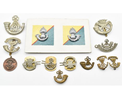 Fourteen British Army Light Infantry badges including Somerset Light Infantry and Cornwall Light Infantry etc, some restrikes