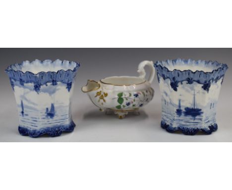 Early 19thC porcelain cream jug with floral decoration, elaborate spout and gilt embellishment, raised on four squat feet, to