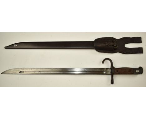 Japanese Arisaka type 30 bayonet stamped 3968115 to pommel, with 40cm fullered blade, with scabbard and frog.&nbsp;PLEASE NOT