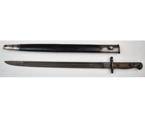 British 1907 pattern bayonet with some stamps to ricasso, wooden grips, 43cm fullered blade and scabbard.&nbsp;PLEASE NOTE AL