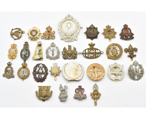 Approximately twenty five British Army and associated badges including United Nations, Physical Training Service, Army Servic