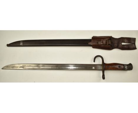 Japanese Arisaka type 30 training bayonet, the 39cm fullered blade with rounded edge, scabbard and frog.&nbsp;PLEASE NOTE ALL