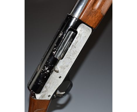 Luigi Franchi Hunter 12 bore semi-automatic shotgun with engraved scenes of hunters in a boat and birds to the lock, chequere