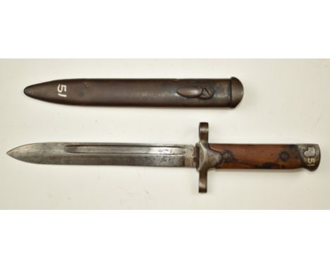 Italian 1938 pattern Mannlicher Carcano bayonet with modified crossguard, wooden grips, 18cm fullered blade and scabbard.&nbs