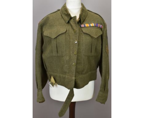 Canadian Army battle dress blouse with rank and proficiency badges, attributed to Sergeant C W L Haynes MM Veterans Guard of 