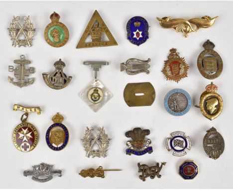 Twenty three Army War Service etc lapel / pin badges including Durham Light Infantry, Royal Observer Corps, The Welsh Regimen