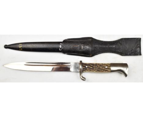 German 1898 pattern bayonet with stag horn grips, Solingen to ricasso, a 20cm blade, scabbard and frog.&nbsp;PLEASE NOTE ALL 