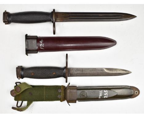 Philippine bayonet with 17cm blade, armed forces emblem to scabbard and frog together with a copy American assault rifle bayo