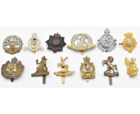 Twelve British Army badges&nbsp;including Royal Hampshire, The Norfolk Regiment, Duke of Lancaster's Own, East Kent Yeomanry,