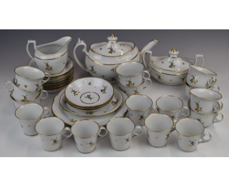 Approximately thirty four pieces of 19thC Worcester Chamberlain porcelain tea ware with enamelled and gilt floral spray decor