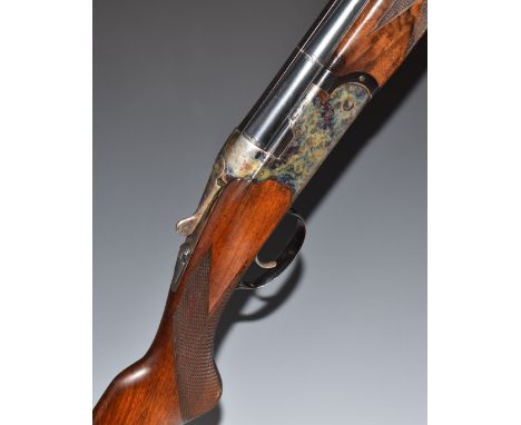 Webley & Scott 12 bore over and under ejector shotgun with named and engraved lock, engraved underside and thumb lever, chequ