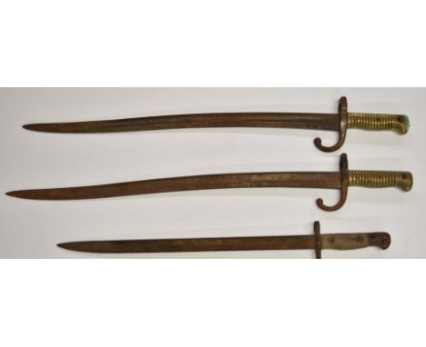 Two French 1866 pattern chassepot bayonets, both with yataghan blades, longest 57cm together with a British 1913 pattern bayo