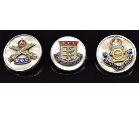 Three mother of pearl and enamel sweetheart brooches for the Royal Artillery, Machine Gun Corps and Army Ordnance Corps, one 