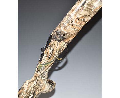 ATA 12 bore over and under ejector shotgun with all over Realtree Max-5 camouflage decoration, chequered semi-pistol grip and