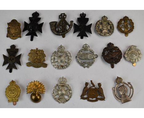 Seventeen British Army badges including 1st Battalion Blackpool Volunteers, Scottish Rifles, Tank Corps, Cardiff Pals and Kin