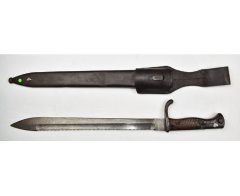 German 98/05 pattern sawback bayonet with wooden grips, Waffenbrink Mauser AG to ricasso, a 36.5cm sawback blade, scabbard an