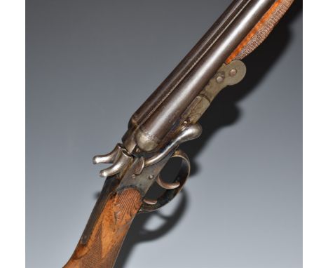 Belgian .410 side by side folding poacher's shotgun with chequered grip and forend, carved decoration to the wrist, engraved 
