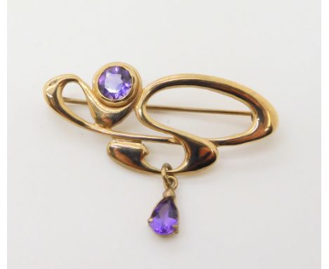 A 9ct gold and amethyst Ortak Brooch, 4cm x 2.8cm, weight 4gms Condition Report: Available upon request