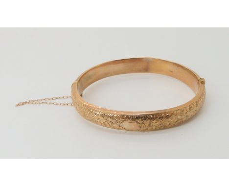 A 9ct rose gold bangle, clasp (af) weight 10.8gms Condition Report: Available upon request