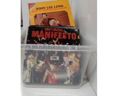 A box of vinyl LPs records with Shakin Stevens, Roxy Music, Michael Jackson, Mud, Roy Clark etc Condition Report: Available u