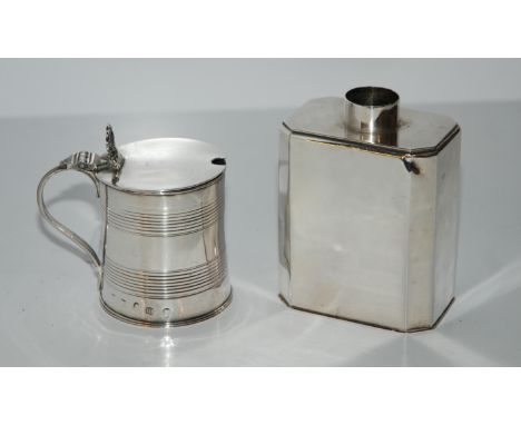 A lot comprising a silver tea caddy London 1922 9.5cm high (missing cover) &amp; a silver mustard pot rubbed marks 6.5cm high