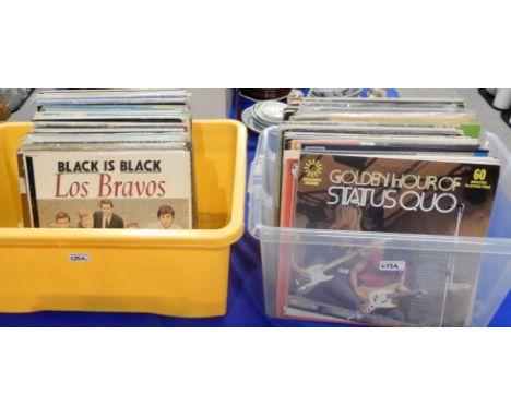 Two boxes of rock, pop and prog rock and movie theme vinyl LP{ records with Queen, The Beach Boys, Status Quo, Peter Frampton
