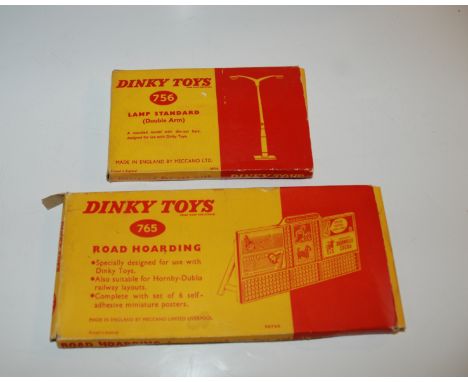 A Dinky Toys 765 Road Hoarding, 756 Lamp Standard and a box of various replica Dinky models including Leyland Octopus, Guy Va