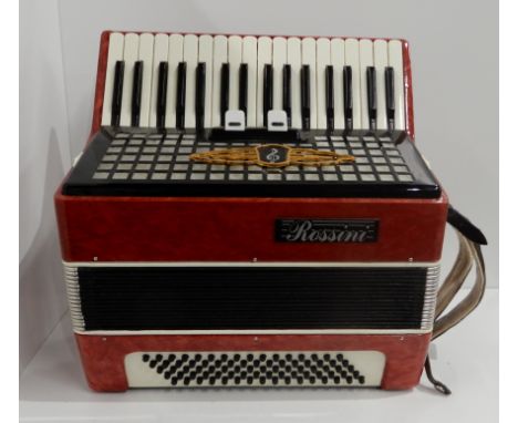 A Rossini Czechoslovakian accordion 34 key 80 bass with a case Condition Report: Available upon request