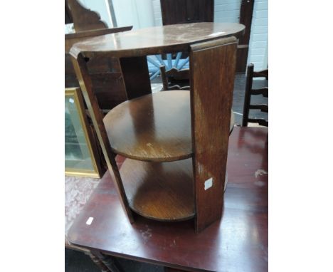 A mid 20th Century oak occasional table/shelf