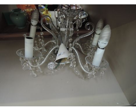 A modern ceiling light fitting, chandeleir style