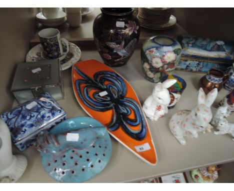 A selection of decorative ceramics including Poole and studio pottery