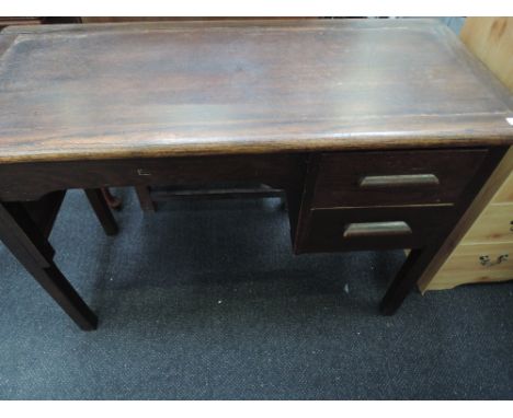 A mid 20th century oak desk